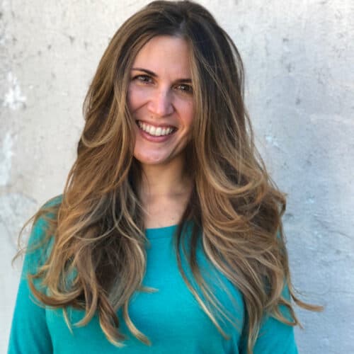 Warm brunette balayage with long waves — hair by Alchemy Loft