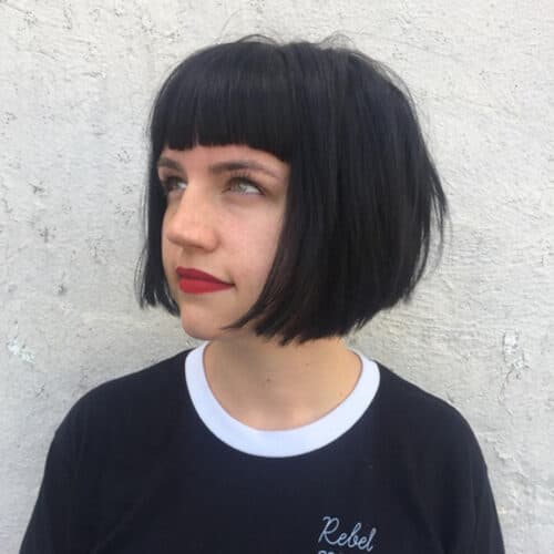 Jet black blunt bob with blunt bangs — hair by Alchemy Loft