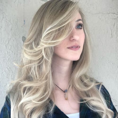 Icy blonde long layers with face-framing — hair by Alchemy Loft
