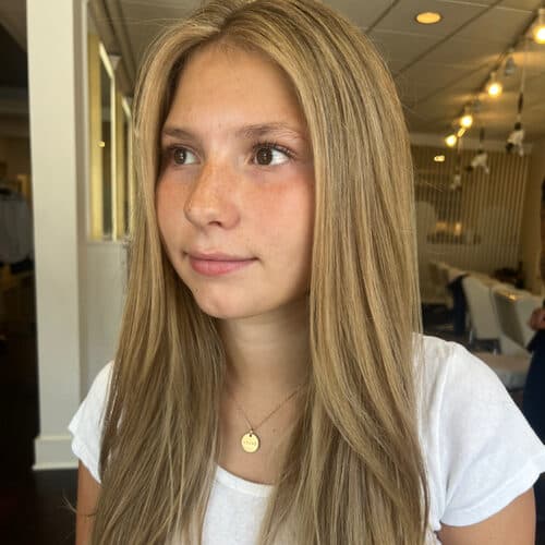 Honey blonde, long and straight — hair by Alchemy Loft